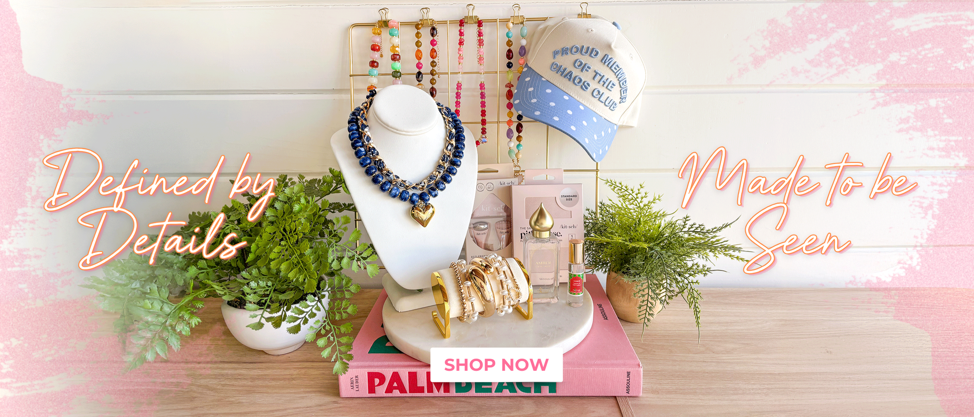Defined by details, made to be seen! Shop now! Lots of fun and colorful accessories. A trucker hat, necklace stacks, bracelets, perfume, and kitsch products 