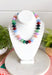 Make a statement with this trendy chunky beaded necklace that's full of color and personality. Featuring bold beads in shades of clear, burgundy, hunter green, green, lilac, blue, and black, this eye-catching accessory is accented with dainty colorful beads between each larger bead for added texture and charm. Whether you're dressing up a simple sweater or adding the finishing touch to your favorite dress, this necklace brings the perfect pop of playful style to any look.