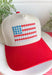 This neutral trucker hat with a red bill is the cutest way to show off your patriotic spirit this summer! The embroidered red, white, and blue floral design creates a unique American flag look that feels both festive and feminine. It’s perfect for the 4th of July, backyard BBQs, lake days, and all your sunny celebrations. With a adjustable fit, it’s as comfortable as it is eye-catching. 