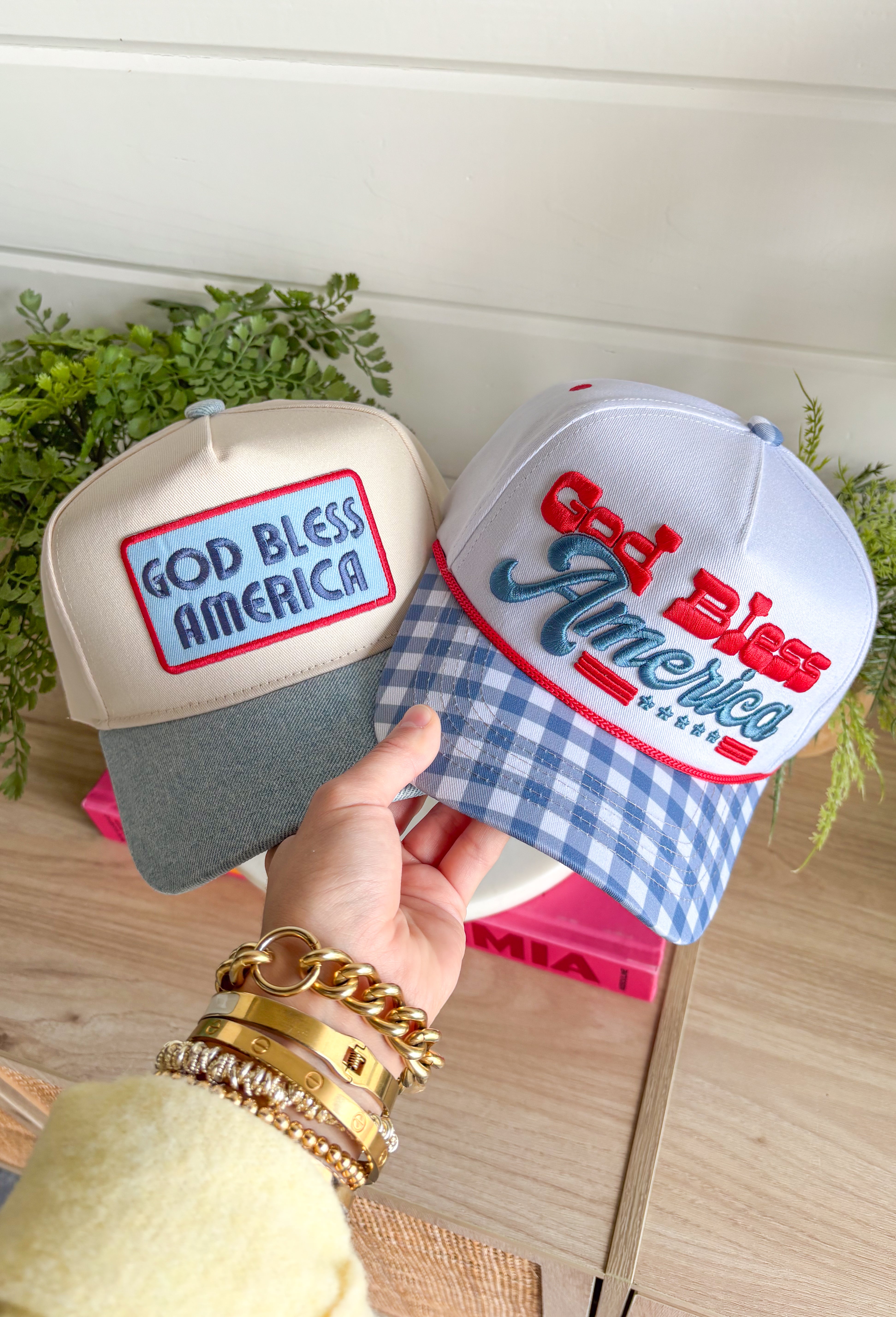 This white trucker hat with a blue gingham bill is the sweetest patriotic touch for your summer lineup! The embroidered “God Bless America” in red and blue adds a festive pop, while the gingham detail keeps it feeling fresh and fun. Perfect for the 4th of July, lake days, or backyard BBQs, this hat is both cute and practical with its breathable design and adjustable fit. It’s an easy way to pull your whole look together while staying cool in the sun. 