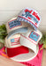 This white trucker hat with red and white trim is the perfect finishing touch for all your summer celebrations! The bold blue patch outlined in red with “God Bless America” adds that classic patriotic feel, while the subtle trim detail along the bill gives it a fun, standout edge. Designed with a adjustable fit, it’s made for long days in the sun—from 4th of July festivities to lake days and backyard BBQs. It’s an easy grab-and-go accessory that instantly pulls your look together. 