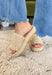 Bring effortless coastal vibes to your wardrobe with these all-over braided raffia platform sandals. Designed with a thick single band for a secure and stylish fit, these Beach By Matisse sandals are a must-have for warm-weather days. The natural woven texture pairs perfectly with everything from breezy dresses to casual denim, making them the ultimate go-to sandals for beach days, brunch dates, and beyond.