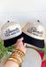 This trucker hat is bringing the attitude—in the best way! Featuring “Blondes Have More Fun” embroidered across the front, it’s the perfect mix of playful and a little bold. The tan base with a black bill keeps it easy to style, while the statement graphic does all the talking. Whether you're heading out for errands, a casual day with friends, or just embracing your blonde era, this hat adds that fun finishing touch. 