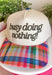 Some days are made for slowing down, and this trucker hat is here for it. Featuring "Busy Doing Nothing" embroidered in a rich deep olive color, it's the perfect accessory for cozy weekends, coffee runs, road trips, and laid-back fall adventures. The colorful plaid bill and matching top button add a fun seasonal touch, giving this hat plenty of personality while keeping it easy to style with your favorite casual outfits. 
