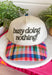 Some days are made for slowing down, and this trucker hat is here for it. Featuring "Busy Doing Nothing" embroidered in a rich deep olive color, it's the perfect accessory for cozy weekends, coffee runs, road trips, and laid-back fall adventures. The colorful plaid bill and matching top button add a fun seasonal touch, giving this hat plenty of personality while keeping it easy to style with your favorite casual outfits. 
