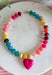 A little color and a lot of heart make this beaded necklace such a fun addition to your jewelry collection. Colorful beads in blue, yellow, burgundy, and pink create a playful mix, while the pink heart charm pendant adds an extra-sweet focal point. Finished with 18K gold-dipped details, it has just the right touch of shine to bring the whole look together. Wear it solo for a cheerful pop of color or layer it with your favorite gold necklaces for a fun, collected look.