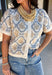 Give your fall layers a vintage-inspired update with this soft short sleeve cardigan from & Merci. The mix of muted denim blue, warm camel, and ivory creates a cozy, lived-in color palette that feels right at home with your favorite autumn outfits. A button-down front makes it easy to wear closed as a top or open over a simple tank for a layered look. Soft and comfortable with just the right amount of stretch, this printed cardigan is an easy statement piece.