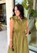 Meet your new throw-on-and-go favorite with this olive utility-inspired midi dress from Entro. The classic olive color keeps it versatile, while the zipper-front closure and adjustable waist give it a sporty, modern feel. A bubble hem adds shape and a fun unexpected finish, while the sleeveless silhouette makes it easy to wear now and layer as the temperatures cool down. Complete with convenient side pockets, this dress is ready for busy workdays, weekend plans, travel days, and everything in between.