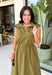 Meet your new throw-on-and-go favorite with this olive utility-inspired midi dress from Entro. The classic olive color keeps it versatile, while the zipper-front closure and adjustable waist give it a sporty, modern feel. A bubble hem adds shape and a fun unexpected finish, while the sleeveless silhouette makes it easy to wear now and layer as the temperatures cool down. Complete with convenient side pockets, this dress is ready for busy workdays, weekend plans, travel days, and everything in between.