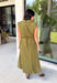 Meet your new throw-on-and-go favorite with this olive utility-inspired midi dress from Entro. The classic olive color keeps it versatile, while the zipper-front closure and adjustable waist give it a sporty, modern feel. A bubble hem adds shape and a fun unexpected finish, while the sleeveless silhouette makes it easy to wear now and layer as the temperatures cool down. Complete with convenient side pockets, this dress is ready for busy workdays, weekend plans, travel days, and everything in between.