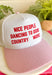 Cue the country playlist—this trucker hat was made for good times and great company! Featuring&nbsp;"Nice People Dancing To Good Country Music" embroidered across the front in bold red stitching, this playful hat is perfect for concerts, tailgates, rodeos, and weekends spent outdoors. The pink and white striped bill adds a fun pop of color, while the matching top button ties the look together. Finished with an adjustable fit, it's the perfect accessory for every country music lover.