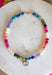 Bright, playful, and full of personality, this colorful beaded necklace is the perfect finishing touch for any outfit. Featuring vibrant multicolored beads, this cheerful accessory is accented with a dazzling crystal rhinestone charm that catches the light beautifully. Whether you wear it on its own as a statement piece or layer it with your favorite gold chains, this necklace adds the perfect pop of color and shine to every look.