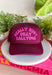 This burgundy trucker hat features “Really Busy Dilly Dallying” in the cutest hot pink bubble font, giving it that fun, carefree personality we love. The bold color combo makes a statement while the classic mesh backing keeps it breathable and easy to wear. Toss it on for errands, ball games, coffee runs, or those days when you’re technically productive… just at your own pace.
