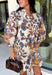 Celebrate the beauty of the season with this effortlessly feminine dress from Entro. Designed with a soft ecru backdrop and a gorgeous floral print in shades of tan, brown, and blue, this timeless dress is perfect for everything from brunch dates to family gatherings. The flattering v-neck collar detail creates a polished look, while the ¾ puff sleeves add a touch of romantic charm.