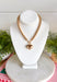 A classic gold necklace gets a sweet statement-making touch with this heart pendant design from Garden Party. Gold beading gives the necklace plenty of texture and shine, while the gold heart pendant creates a timeless focal point at the center. A toggle detail adds another eye-catching element and gives the piece a little extra personality. Easy to dress up or down, it’s the kind of necklace that works just as well with your everyday favorites as it does with dresses and special occasion looks.