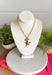 A little sparkle with a playful star detail! This gold open chain necklace features a textured star pendant paired with a textured circle charm and a delicate crystal accent for the perfect hint of shine. The layered charm design adds dimension and personality while still feeling effortless and easy to wear. Trendy yet timeless, this piece looks beautiful worn on its own or layered with your favorite gold necklaces. 