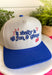 Life's too short not to have a little fun! This trucker hat features&nbsp;"It Really Is All Fun &amp; Games" embroidered in royal blue with red embroidered heart and dice details for the perfect playful touch. The neutral crown paired with the royal blue bill creates a classic color combination that's easy to style, while the fun graphic adds personality to every outfit. 