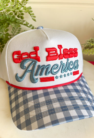 This white trucker hat with a blue gingham bill is the sweetest patriotic touch for your summer lineup! The embroidered “God Bless America” in red and blue adds a festive pop, while the gingham detail keeps it feeling fresh and fun. Perfect for the 4th of July, lake days, or backyard BBQs, this hat is both cute and practical with its breathable design and adjustable fit. It’s an easy way to pull your whole look together while staying cool in the sun. 