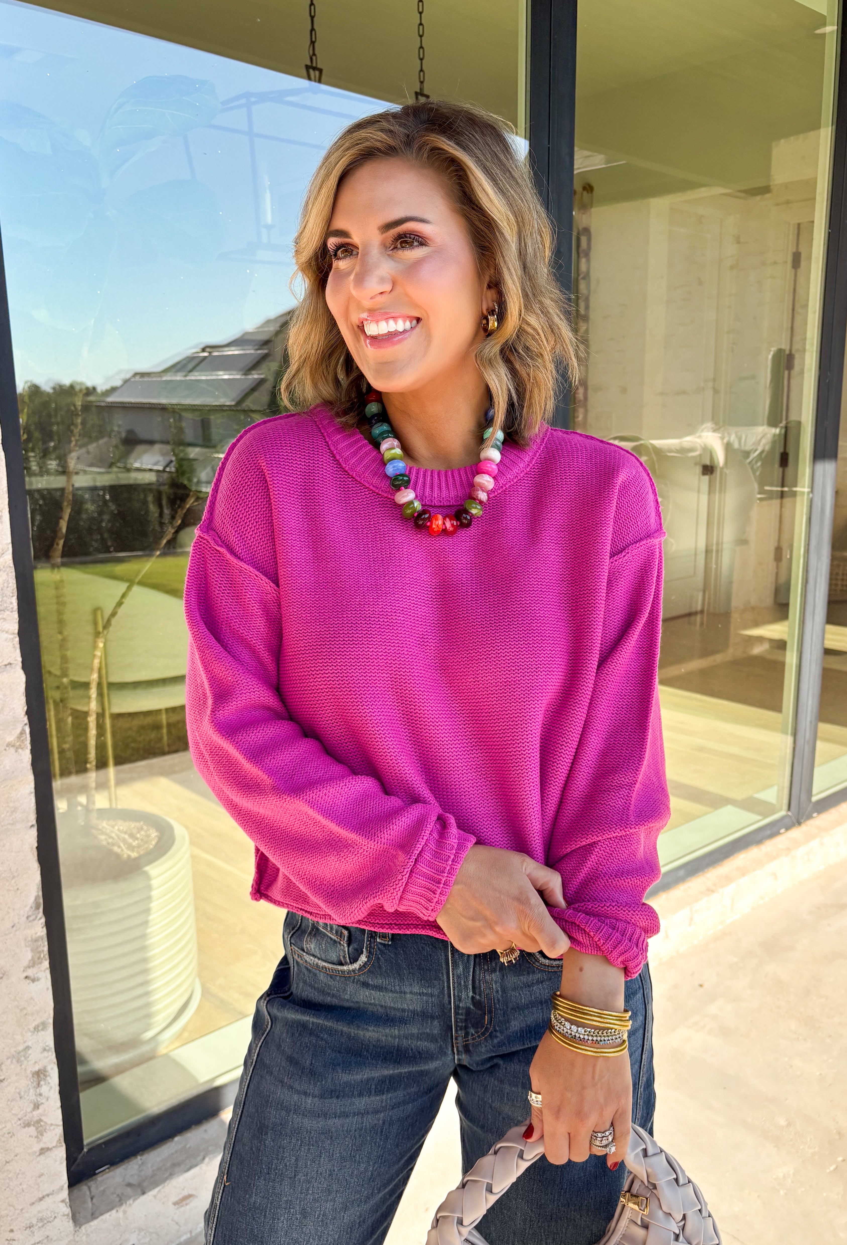 Nothing says cozy season like a classic fuchsia sweater, and this timeless knit from Double Zero is one you'll reach for again and again. Designed in a fuchsia hue, this effortlessly versatile sweater features exposed seam detailing that adds a modern touch to its classic silhouette. Ribbed trim at the neckline and cuffs provides a polished finish, while the soft knit construction keeps you warm and comfortable all day long.
