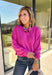 Nothing says cozy season like a classic fuchsia sweater, and this timeless knit from Double Zero is one you'll reach for again and again. Designed in a fuchsia hue, this effortlessly versatile sweater features exposed seam detailing that adds a modern touch to its classic silhouette. Ribbed trim at the neckline and cuffs provides a polished finish, while the soft knit construction keeps you warm and comfortable all day long.