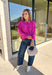 Nothing says cozy season like a classic fuchsia sweater, and this timeless knit from Double Zero is one you'll reach for again and again. Designed in a fuchsia hue, this effortlessly versatile sweater features exposed seam detailing that adds a modern touch to its classic silhouette. Ribbed trim at the neckline and cuffs provides a polished finish, while the soft knit construction keeps you warm and comfortable all day long.