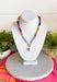 This colorful beaded necklace is the perfect accessory for adding a playful pop to your summer style! Featuring vibrant beads, a chic gold toggle clasp, and a pearl pendant charm, it combines trendy details with a timeless touch. The mix of color and pearl accents creates a fun, elevated look that's easy to wear with everything from casual tanks to breezy dresses. Whether you're heading on vacation, brunch with friends, or simply brightening up an everyday outfit, this necklace is sure to become a favorite.