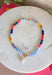 This colorful beaded necklace is the perfect accessory for adding a playful pop to your summer style! Featuring vibrant beads, a chic gold toggle clasp, and a pearl pendant charm, it combines trendy details with a timeless touch. The mix of color and pearl accents creates a fun, elevated look that's easy to wear with everything from casual tanks to breezy dresses. Whether you're heading on vacation, brunch with friends, or simply brightening up an everyday outfit, this necklace is sure to become a favorite.