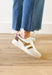 Gola Grandslam Trident Sneakers in Brown Sugar, white sneaker with cognac stripes on the side, light grey suede around the toe, mocha on the heel, faded mauve on the top of the heel