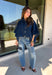 Give your everyday layers a fresh update with this dark wash denim jacket from Entro. The rich denim wash brings a classic feel to the relaxed, draped silhouette, making it an easy piece to throw on when your outfit needs a little something extra. Snap buttons down the front keep the look casual, while chest pockets and additional front pockets add functional detail. Snap button closures at the sides give the design an unexpected finishing touch while complementing its easygoing shape. 