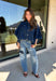 Give your everyday layers a fresh update with this dark wash denim jacket from Entro. The rich denim wash brings a classic feel to the relaxed, draped silhouette, making it an easy piece to throw on when your outfit needs a little something extra. Snap buttons down the front keep the look casual, while chest pockets and additional front pockets add functional detail. Snap button closures at the sides give the design an unexpected finishing touch while complementing its easygoing shape. 