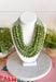 Add a pretty pop of olive to your look with this eye-catching layered beaded necklace. Featuring seven strands of light purple beads, this chunky statement piece creates a full, dimensional look that makes even the simplest outfit feel a little more fun. The faux leather backing helps keep each layer beautifully arranged, while the magnetic closure makes it easy to put on and take off. It’s the perfect finishing touch for sweaters, dresses, blouses, and everyday basics.
