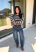 Wrap yourself in the colors of the season with this cozy open knit sweater from Hyfve. Featuring a beautiful stripe pattern in cream, tan, light blue, burgundy, hunter green, and dark blue, this timeless knit captures everything you love about fall. The lightweight open knit construction makes it perfect for layering on crisp mornings and cool evenings, while the relaxed silhouette keeps it effortlessly comfortable. 