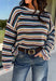 Wrap yourself in the colors of the season with this cozy open knit sweater from Hyfve. Featuring a beautiful stripe pattern in cream, tan, light blue, burgundy, hunter green, and dark blue, this timeless knit captures everything you love about fall. The lightweight open knit construction makes it perfect for layering on crisp mornings and cool evenings, while the relaxed silhouette keeps it effortlessly comfortable. 