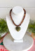 Fun, playful, and full of personality. This necklace features brown beading paired with a olive heart pendant for the perfect touch of contrast. Lightweight and easy to style, this necklace looks just as cute worn on its own as it does layered with your favorite chains and beaded pieces. It’s the perfect finishing touch for adding a subtle pop of color to your everyday outfits.