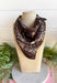 Add an easy western-inspired touch to your outfit with this brown bandana neck scarf. The rich brown color makes it a versatile accessory for fall while the soft material keeps it comfortable enough to wear all day long. Tie it around your neck for a classic bandana look, wear it as a headband, or knot it onto your favorite handbag for a fun pop of personality. From gameday and concerts to weekend plans and fall outings, there are plenty of ways to make this scarf your own.