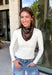 Add an easy western-inspired touch to your outfit with this brown bandana neck scarf. The rich brown color makes it a versatile accessory for fall while the soft material keeps it comfortable enough to wear all day long. Tie it around your neck for a classic bandana look, wear it as a headband, or knot it onto your favorite handbag for a fun pop of personality. From gameday and concerts to weekend plans and fall outings, there are plenty of ways to make this scarf your own.