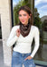 Add an easy western-inspired touch to your outfit with this brown bandana neck scarf. The rich brown color makes it a versatile accessory for fall while the soft material keeps it comfortable enough to wear all day long. Tie it around your neck for a classic bandana look, wear it as a headband, or knot it onto your favorite handbag for a fun pop of personality. From gameday and concerts to weekend plans and fall outings, there are plenty of ways to make this scarf your own.