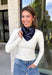 Add an easy western-inspired touch to your outfit with this navy bandana neck scarf. The rich navy color makes it a versatile accessory for fall while the soft material keeps it comfortable enough to wear all day long. Tie it around your neck for a classic bandana look, wear it as a headband, or knot it onto your favorite handbag for a fun pop of personality. From gameday and concerts to weekend plans and fall outings, there are plenty of ways to make this scarf your own.