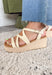 Effortless, versatile, and perfect for sunny days! These neutral wedge sandals feature soft neutral straps in a flattering criss cross design that pairs with just about everything in your closet. The woven espadrille platform adds that classic warm-weather touch, giving you a little height while still feeling easy to walk in. Finished with an adjustable ankle buckle for a secure fit, these wedges are perfect for dressing up your everyday looks or adding a polished touch to your favorite dresses.