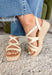 Effortless, versatile, and perfect for sunny days! These neutral wedge sandals feature soft neutral straps in a flattering criss cross design that pairs with just about everything in your closet. The woven espadrille platform adds that classic warm-weather touch, giving you a little height while still feeling easy to walk in. Finished with an adjustable ankle buckle for a secure fit, these wedges are perfect for dressing up your everyday looks or adding a polished touch to your favorite dresses.