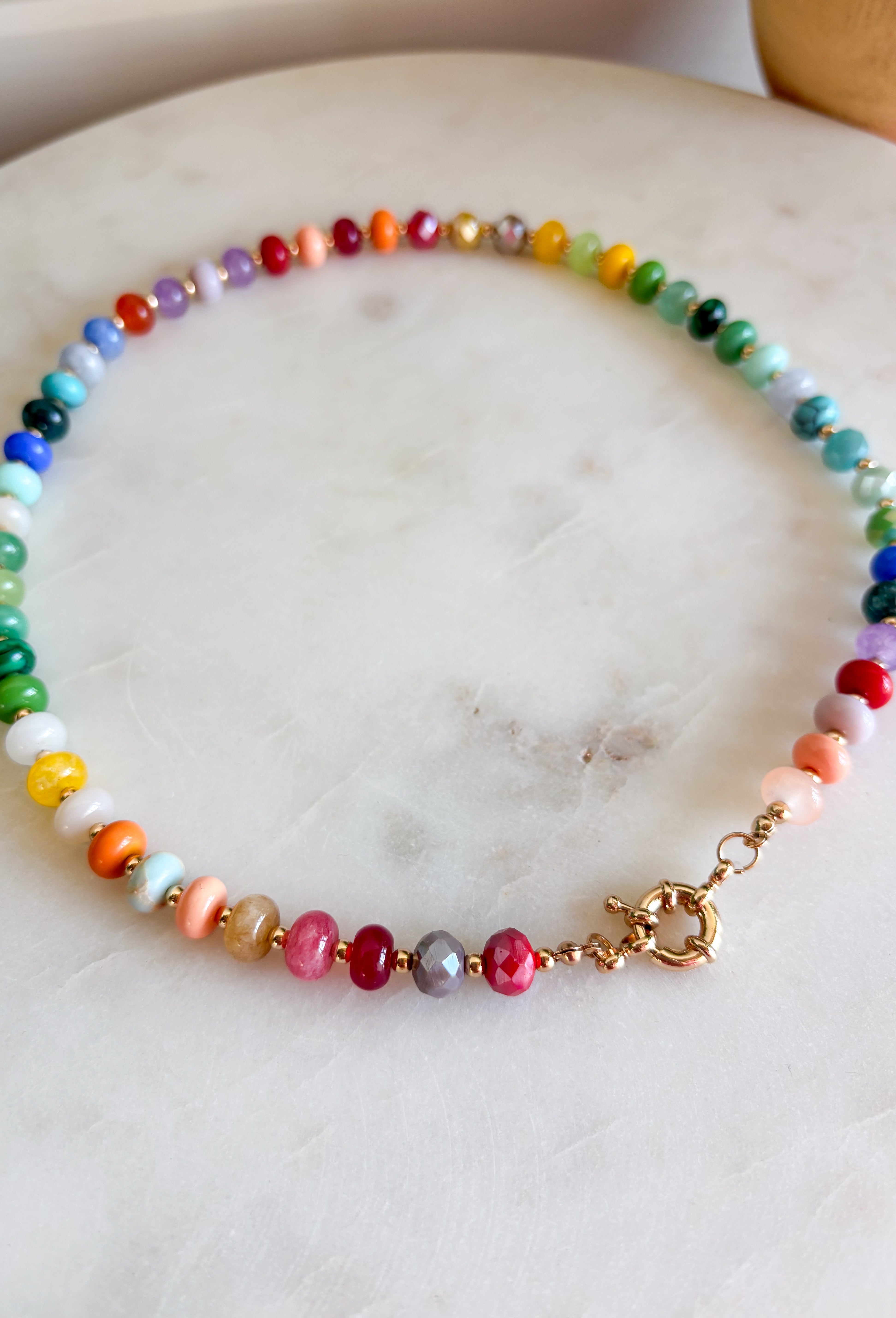 Add a fun pop of color to every outfit with this trendy beaded necklace! Featuring a vibrant mix of colorful beads, this playful accessory is perfect for brightening up everything from casual tees to cozy sweaters. The gold toggle clasp adds a modern, elevated finish, making it just as stylish worn on its own as it is layered with your favorite chains. It's the perfect statement piece for every season.
