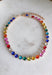 This vibrant rainbow gemstone necklace is pure spring joy in accessory form. Featuring faceted crystal stones in bold, playful colors, each gem is set in a warm gold setting that adds just the right touch of polish. The mix of colors makes it an instant outfit-lifter—perfect for adding personality to everyday looks or finishing off a fun spring outfit. Wear it solo as a statement or layer it with your favorite gold chains for an easy, colorful moment.