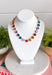 Add a meaningful touch of color to your jewelry collection with this beautiful cross necklace. Featuring a strand of colorful rhinestone crystals in shades of red, blue, green, pink, and gold, this eye-catching piece is finished with a matching cross pendant for the perfect blend of faith and style. The vibrant colors and delicate gold accents make it a standout accessory that's easy to wear for both everyday outfits and special occasions.