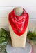Add an easy western-inspired touch to your outfit with this red bandana neck scarf. The bold red color makes it a versatile accessory for fall while the soft material keeps it comfortable enough to wear all day long. Tie it around your neck for a classic bandana look, wear it as a headband, or knot it onto your favorite handbag for a fun pop of personality. From gameday and concerts to weekend plans and fall outings, there are plenty of ways to make this scarf your own.