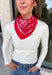 Add an easy western-inspired touch to your outfit with this red bandana neck scarf. The bold red color makes it a versatile accessory for fall while the soft material keeps it comfortable enough to wear all day long. Tie it around your neck for a classic bandana look, wear it as a headband, or knot it onto your favorite handbag for a fun pop of personality. From gameday and concerts to weekend plans and fall outings, there are plenty of ways to make this scarf your own.