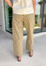 Step into fall with denim that's anything but ordinary! These tan barrel jeans feature a charming white polka dot print that adds the perfect touch of personality while staying easy to style. The on-trend barrel leg silhouette gives them a modern, fashion-forward feel, and the warm neutral color makes them a versatile addition to your autumn wardrobe. Whether you're pairing them with a cozy sweater, a fitted knit, or your favorite blouse, these jeans are guaranteed to make a statement. 