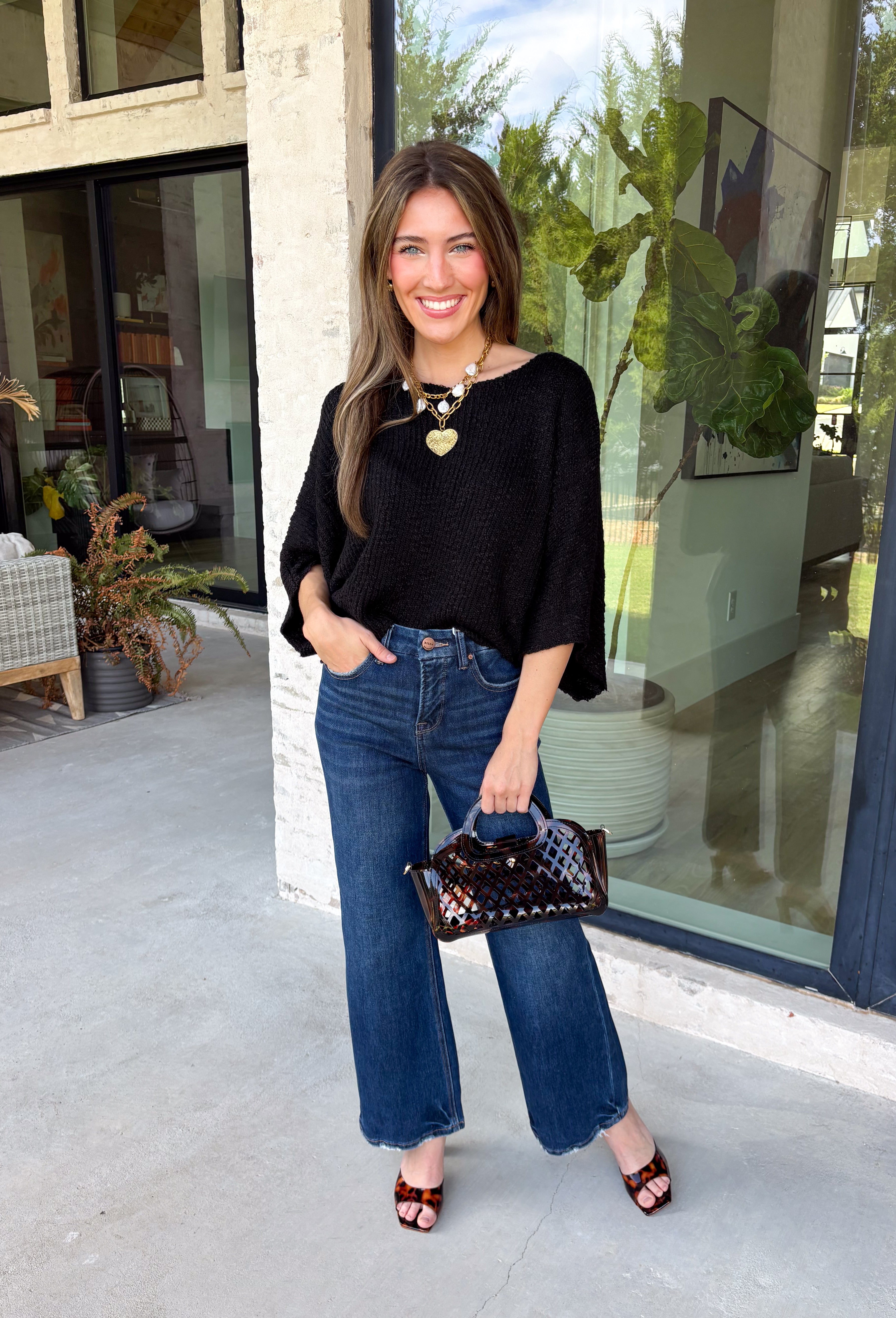 A timeless sweater is a staple every wardrobe needs, and this classic knit from Hyfve is one you'll wear season after season. Designed in a versatile black hue, this cozy short sleeve sweater offers endless styling possibilities. The simple silhouette makes it easy to pair with everything from your favorite denim to tailored trousers, while the soft knit keeps you comfortable throughout the day. 