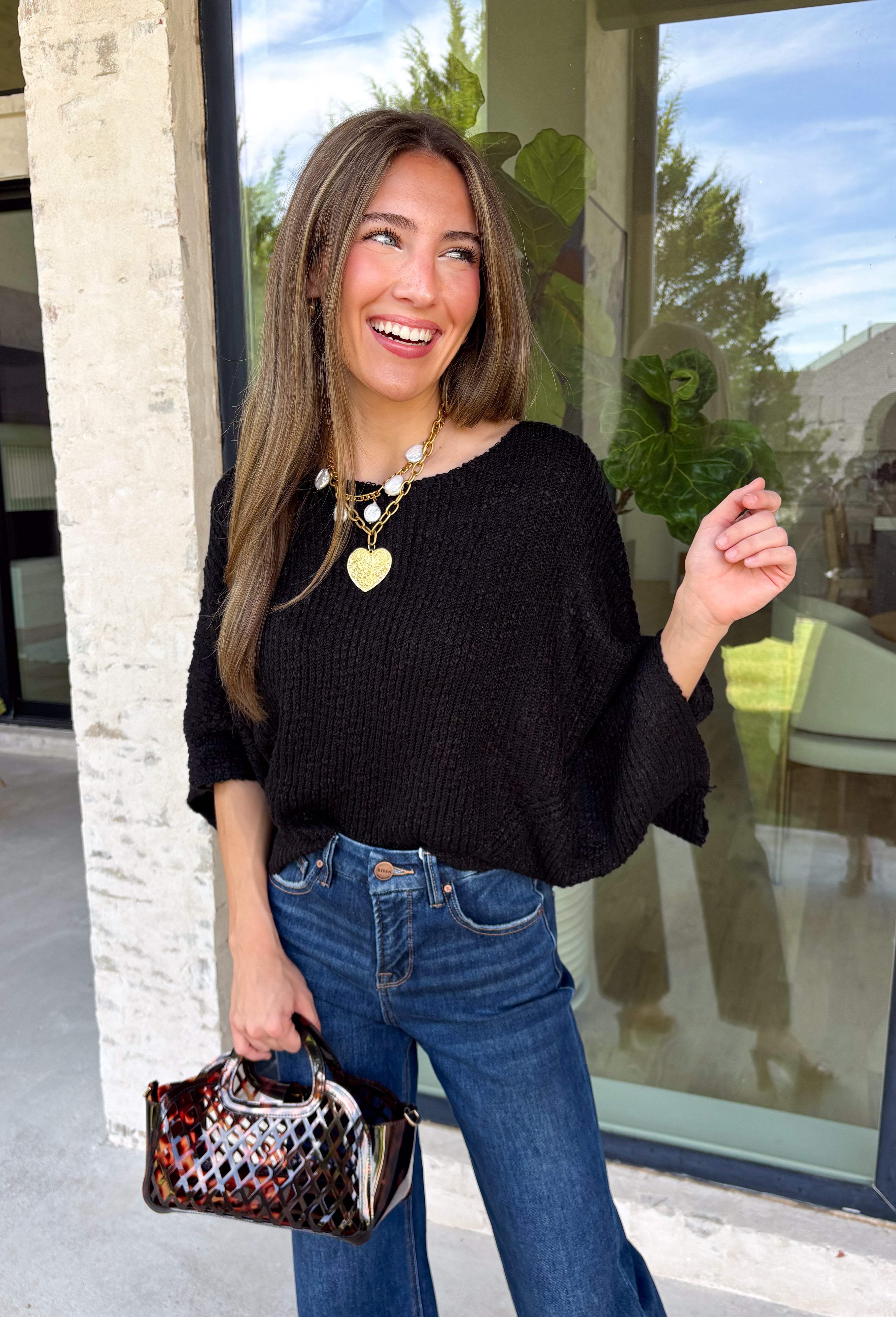 A timeless sweater is a staple every wardrobe needs, and this classic knit from Hyfve is one you'll wear season after season. Designed in a versatile black hue, this cozy short sleeve sweater offers endless styling possibilities. The simple silhouette makes it easy to pair with everything from your favorite denim to tailored trousers, while the soft knit keeps you comfortable throughout the day. 