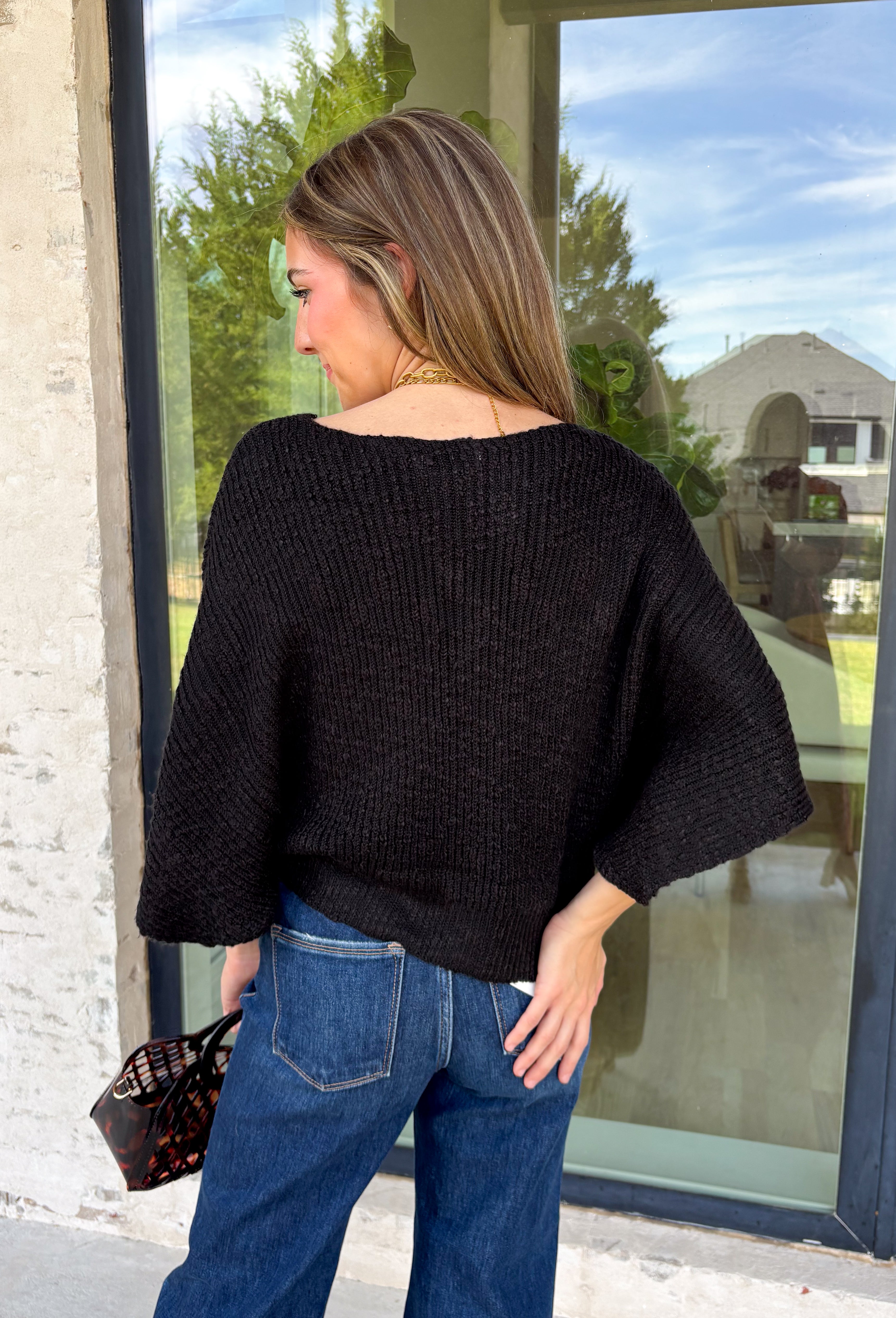 A timeless sweater is a staple every wardrobe needs, and this classic knit from Hyfve is one you'll wear season after season. Designed in a versatile black hue, this cozy short sleeve sweater offers endless styling possibilities. The simple silhouette makes it easy to pair with everything from your favorite denim to tailored trousers, while the soft knit keeps you comfortable throughout the day. 