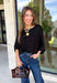 A timeless sweater is a staple every wardrobe needs, and this classic knit from Hyfve is one you'll wear season after season. Designed in a versatile black hue, this cozy short sleeve sweater offers endless styling possibilities. The simple silhouette makes it easy to pair with everything from your favorite denim to tailored trousers, while the soft knit keeps you comfortable throughout the day. 